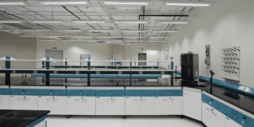 Home page laboratory furniture setup featuring modular workstations, integrated storage cabinets, and pegboard panels for efficient glassware drying and lab organization.